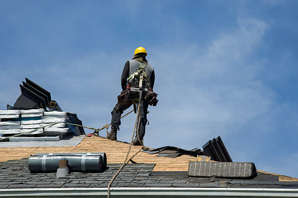 Professional Roofing technician working in Guilderland Center, NY